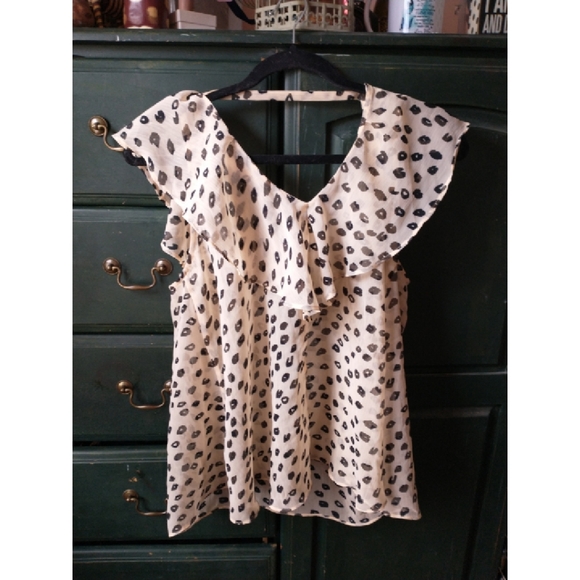 BCBGeneration Tops - HEAT WAVE SALE! BCBG Cream with Black Sheer Blouse. Size Large.